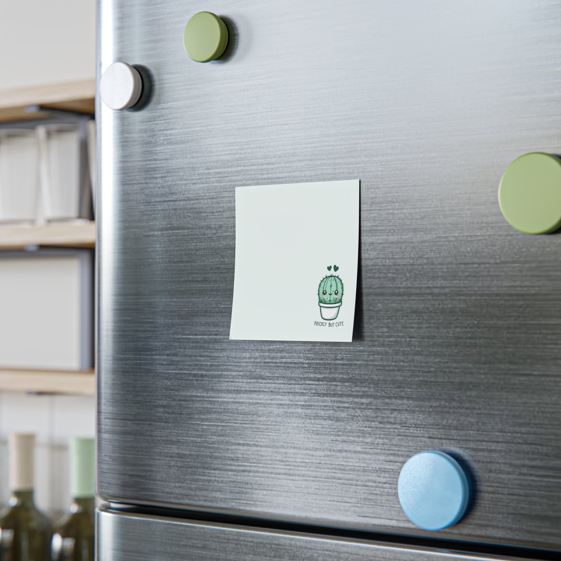 Fridge with decorative magnets and a sticky note