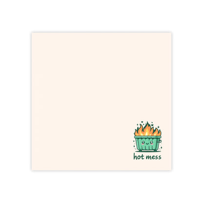 Notepad with a cartoon cactus illustration and 'hot mess' text on a beige background