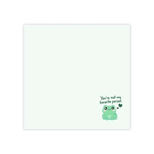 Card with a green frog illustration and text on a white background