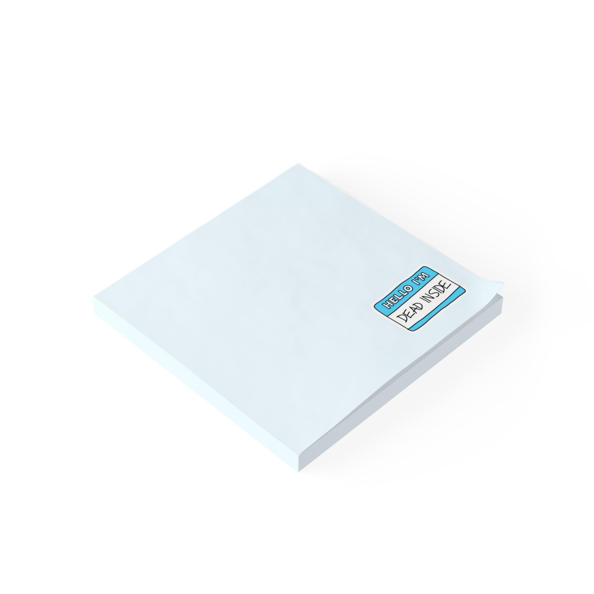 Stack of white sticky notes with a blue label on a white background