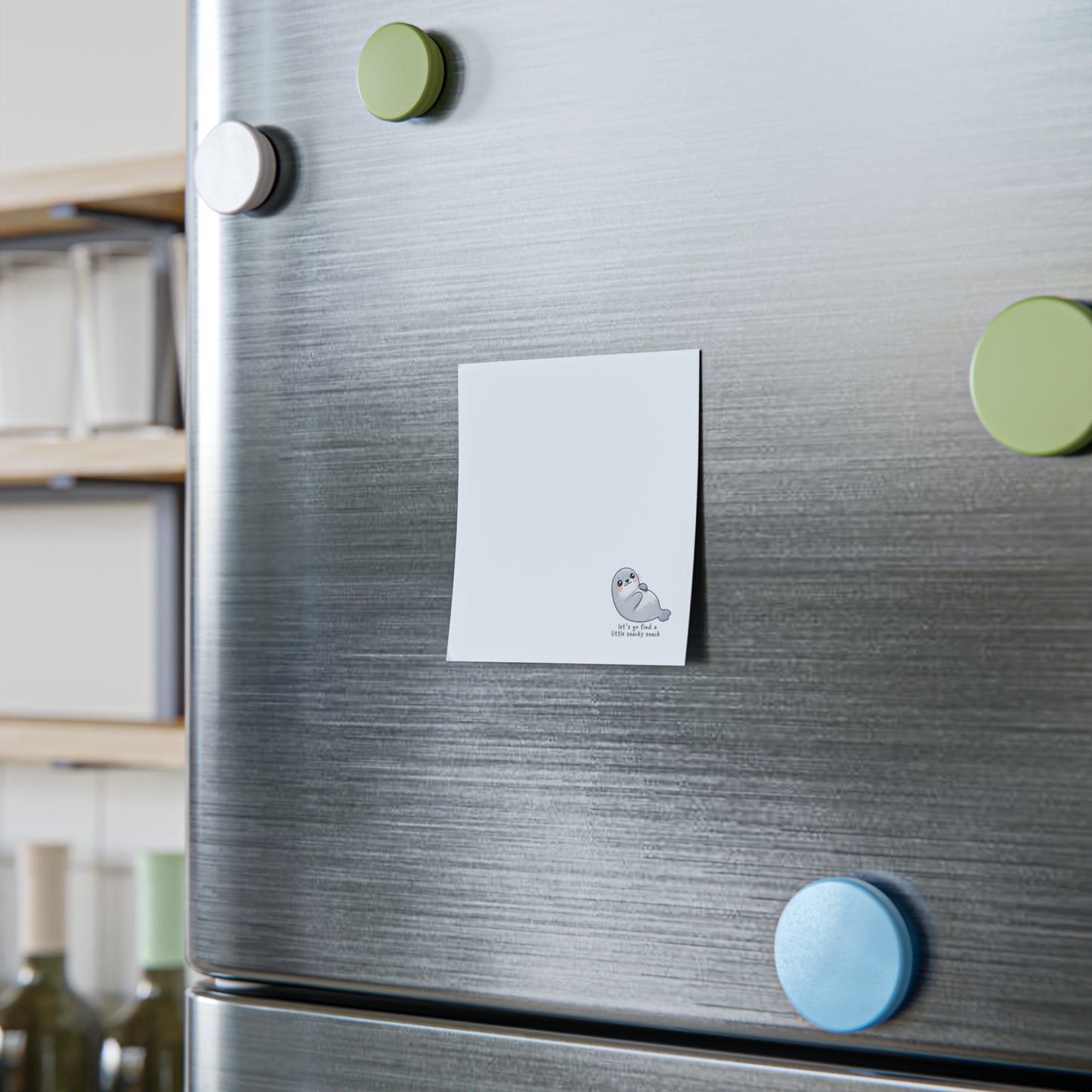 Fridge with magnets and a sticky note on a kitchen background