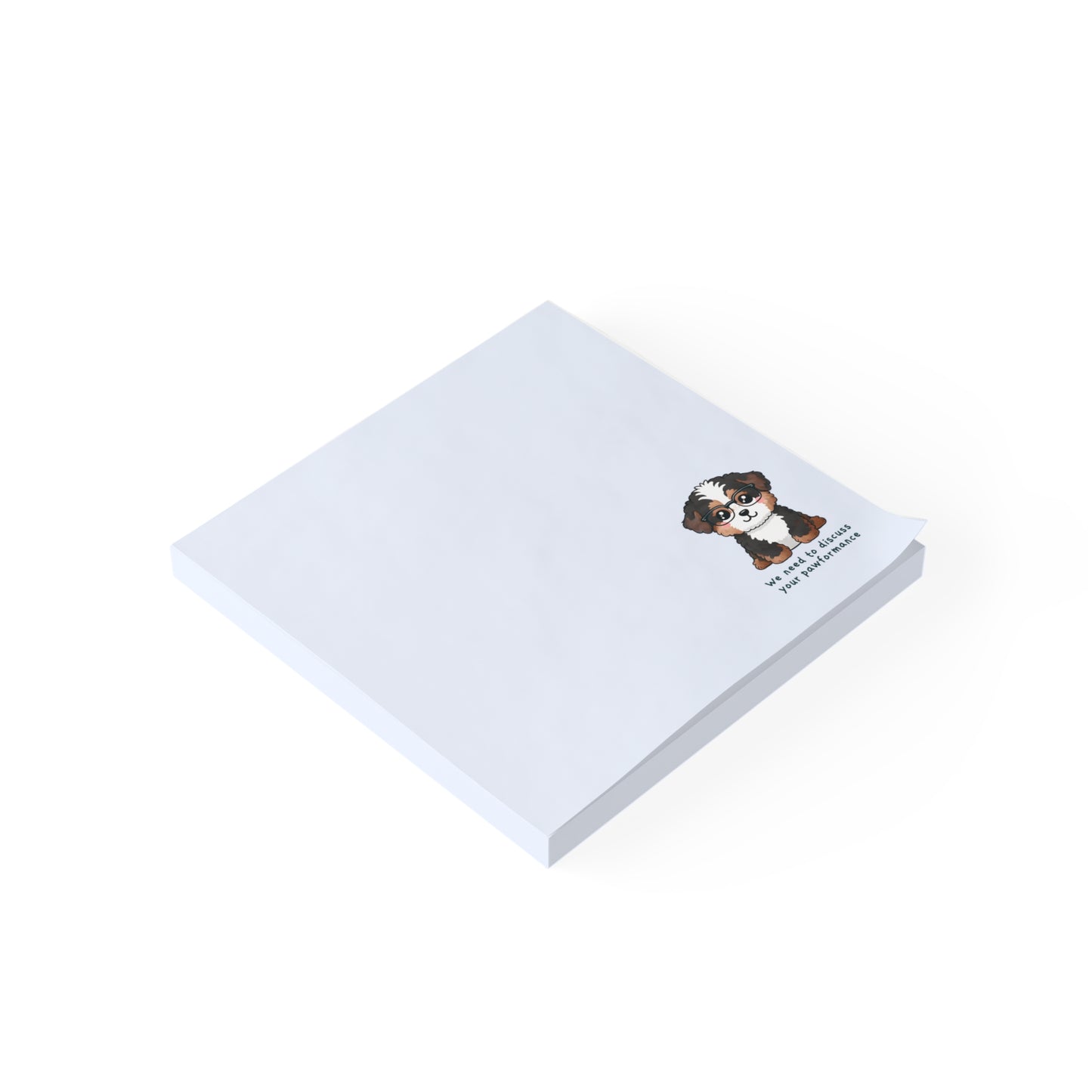 White notepad with a dog illustration and text on a white background