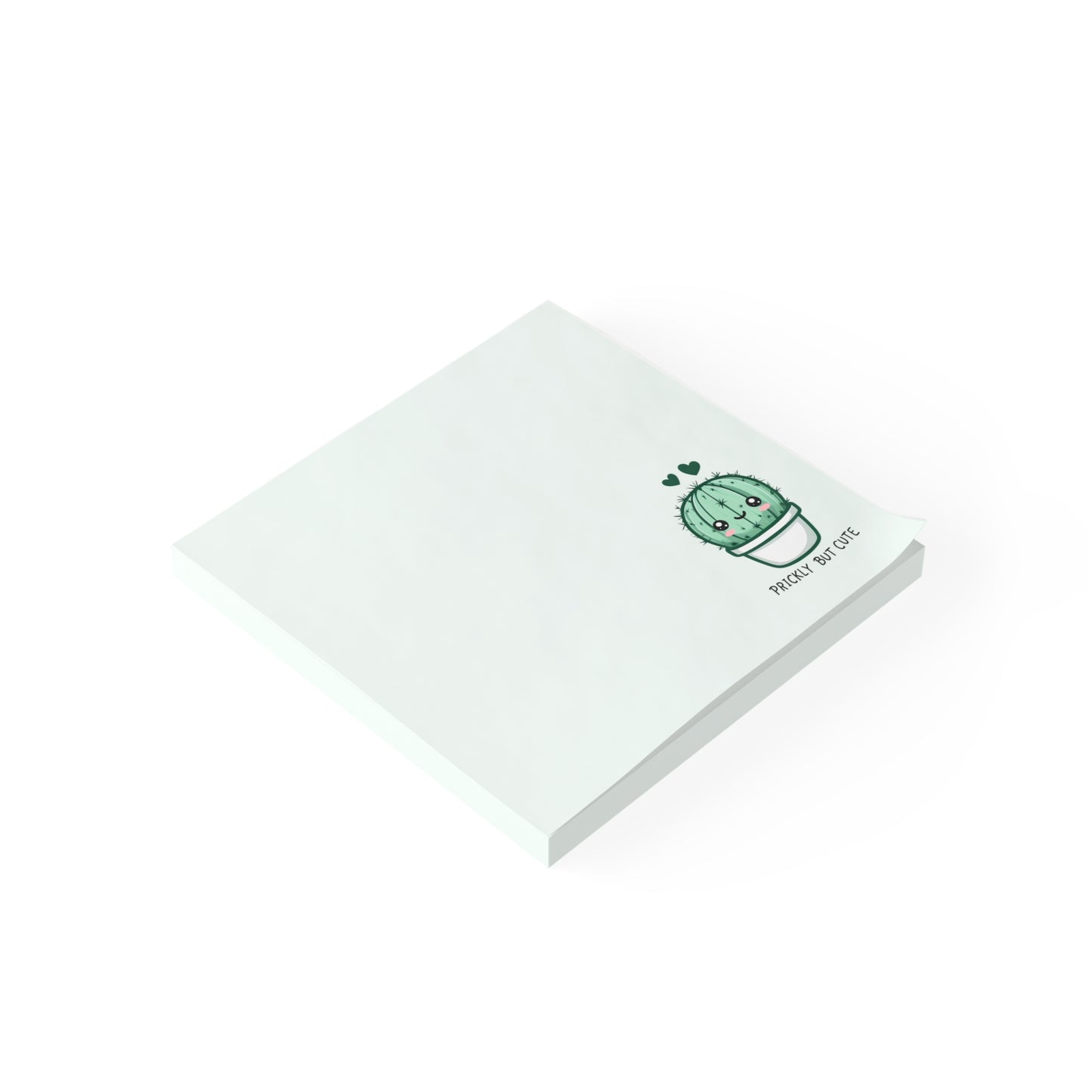 White notepad with a green cactus design on a white background