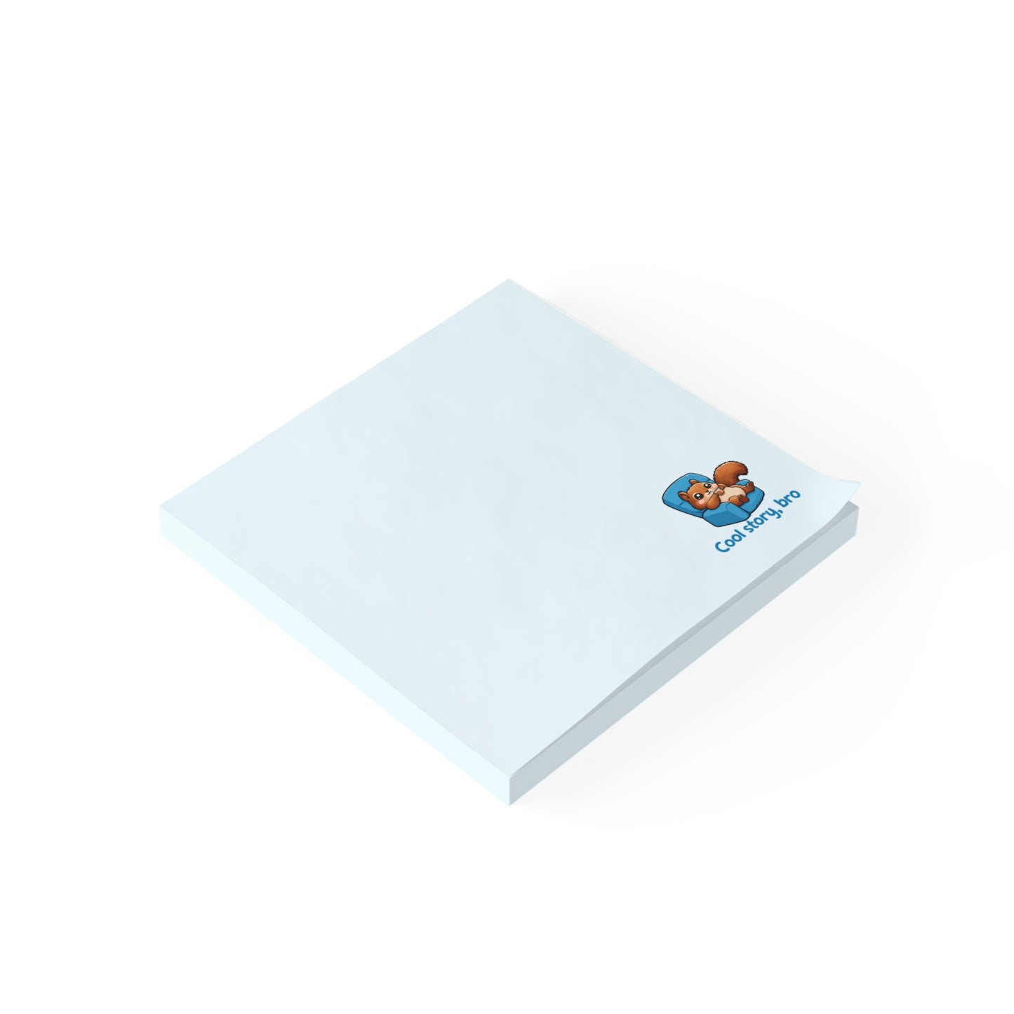 Angled view of a light blue sticky note pad with a cute squirrel design near the corner.