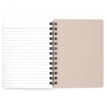 Open back cover of solid Beige spiral notebook showing white lined notebook paper