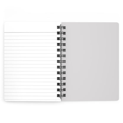 Open notebook with lined pages on a white background