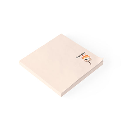 Beige notepad with a cartoon marshmallow design on a white background