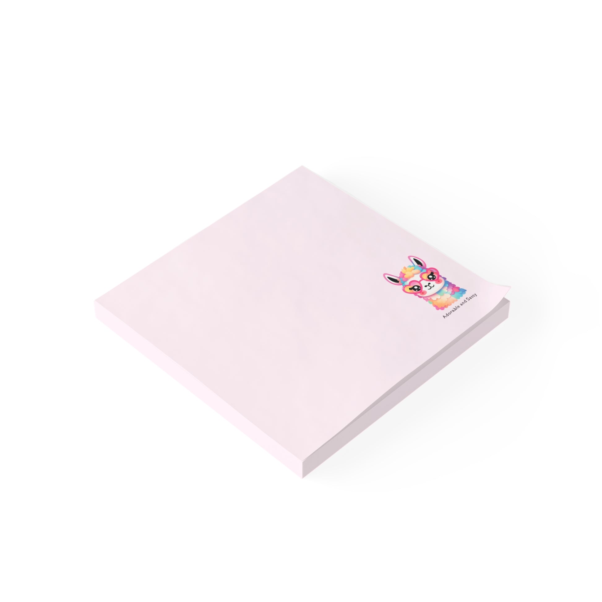 Pink notepad with a colorful cartoon character on a white background
