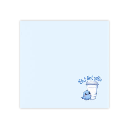 Notepad with a blue bird and coffee cup illustration on a light blue background