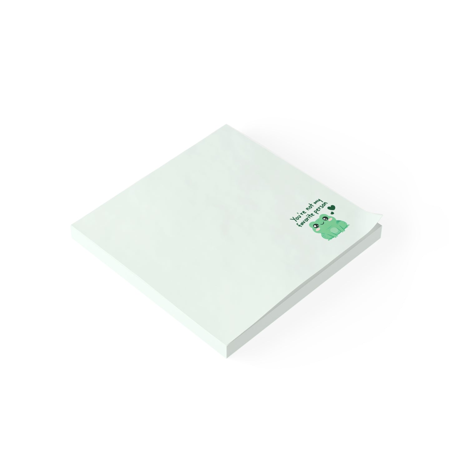 White notepad with a green design on a white background
