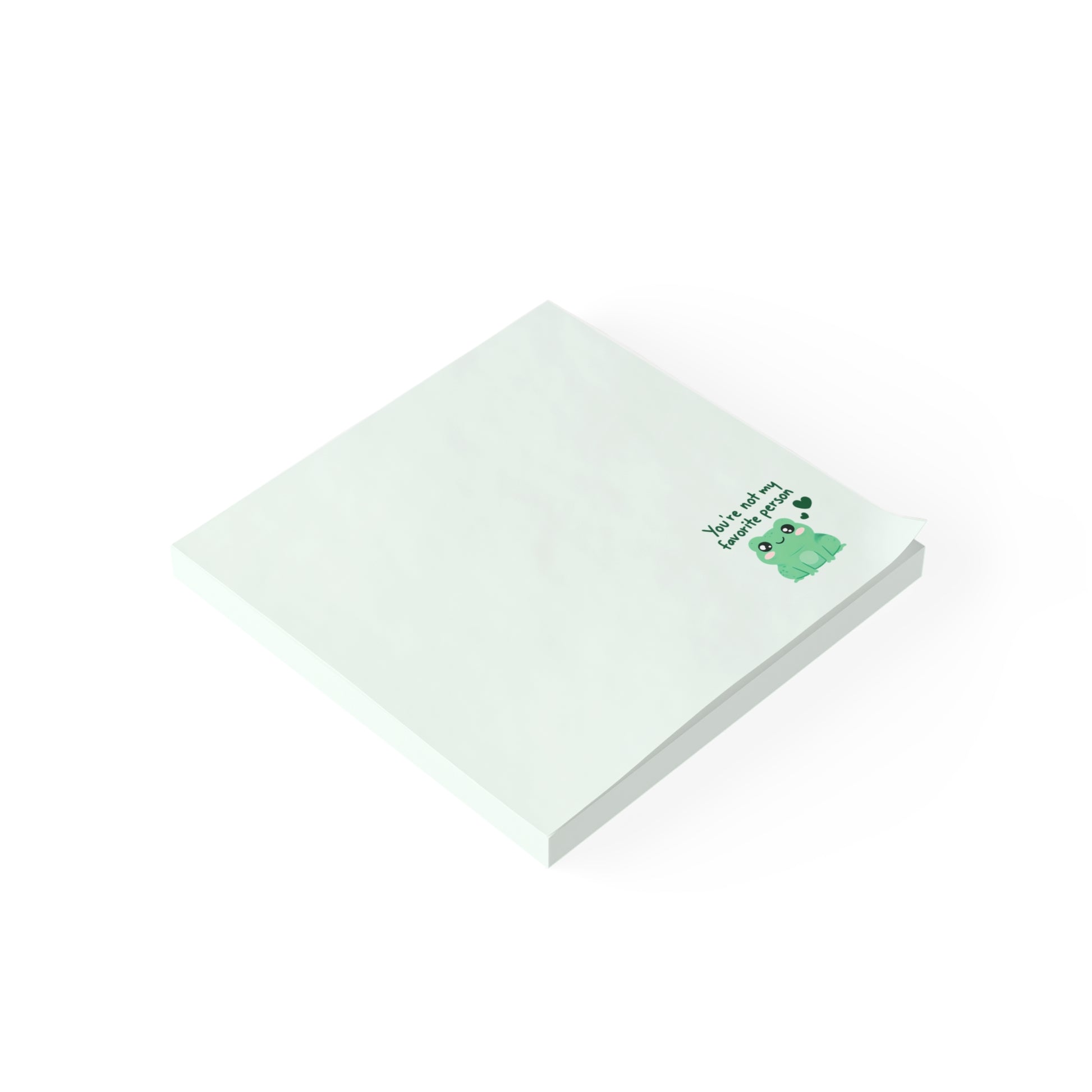 White notepad with a green design on a white background
