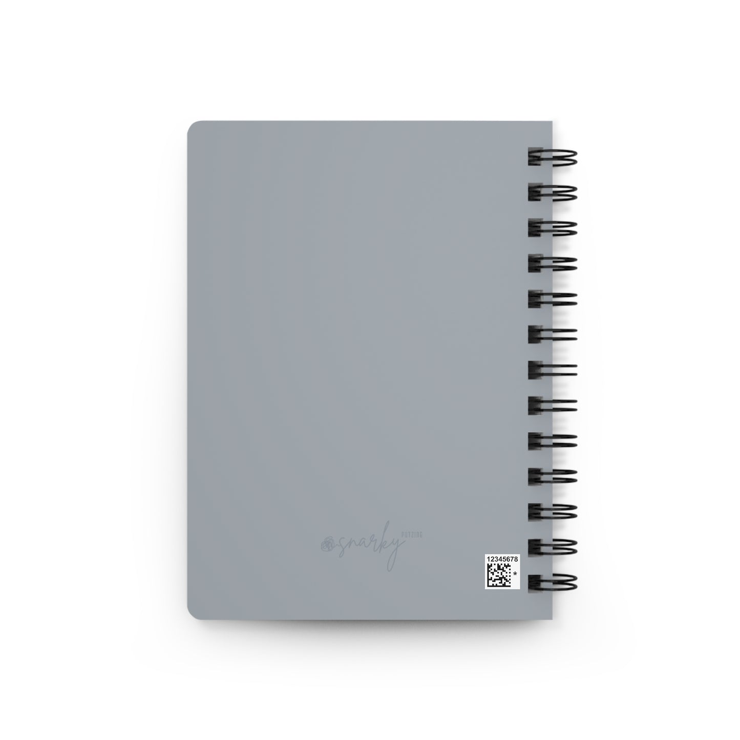 Gray notebook with spiral binding on a white background