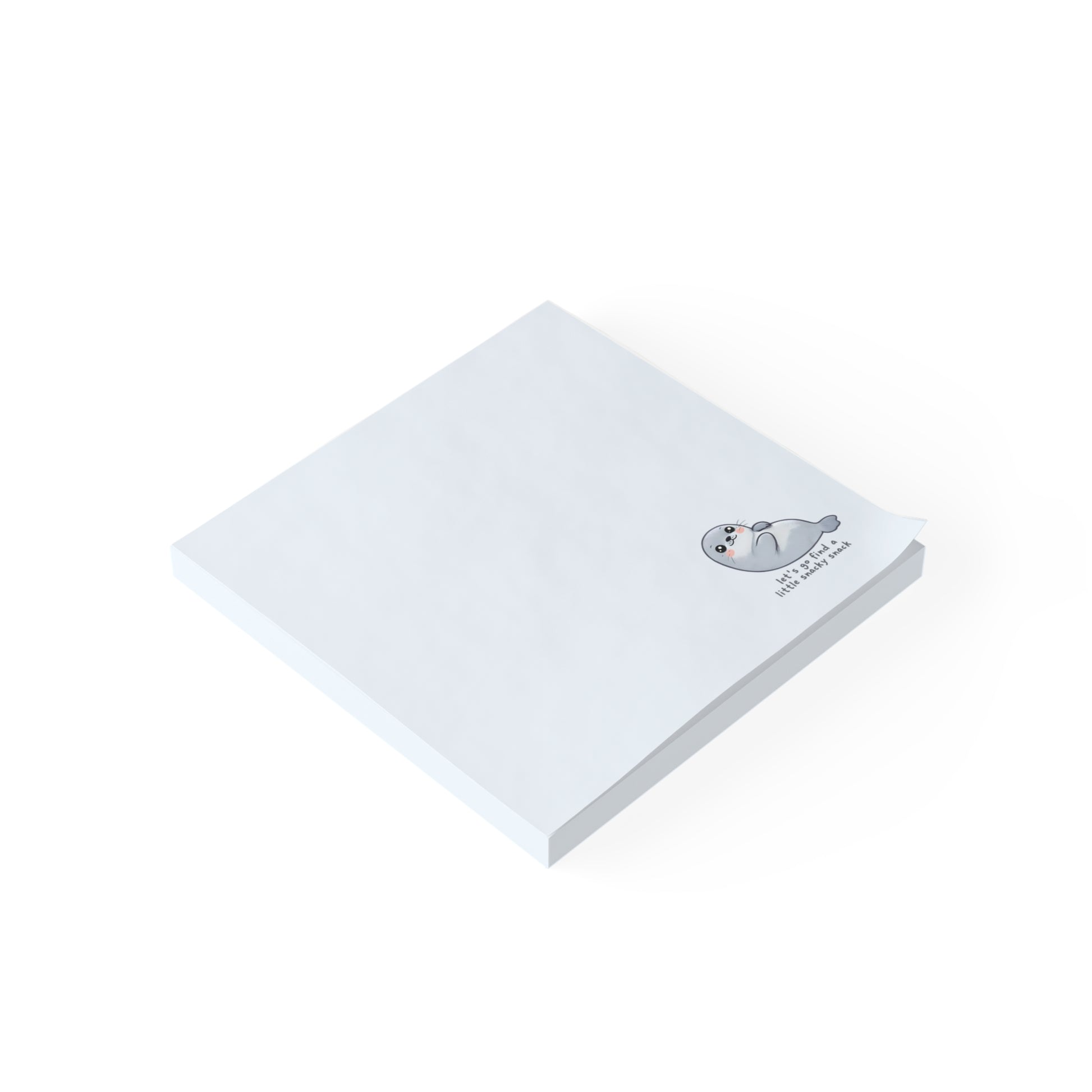 Blue sticky note with a seal illustration and text on a white background