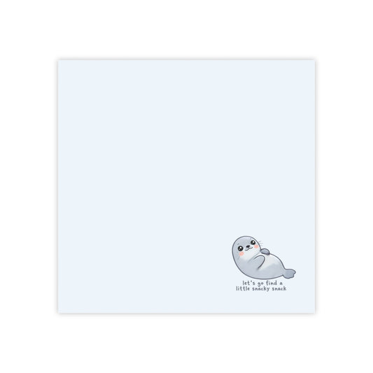 Note card with a seal illustration and text on a white background