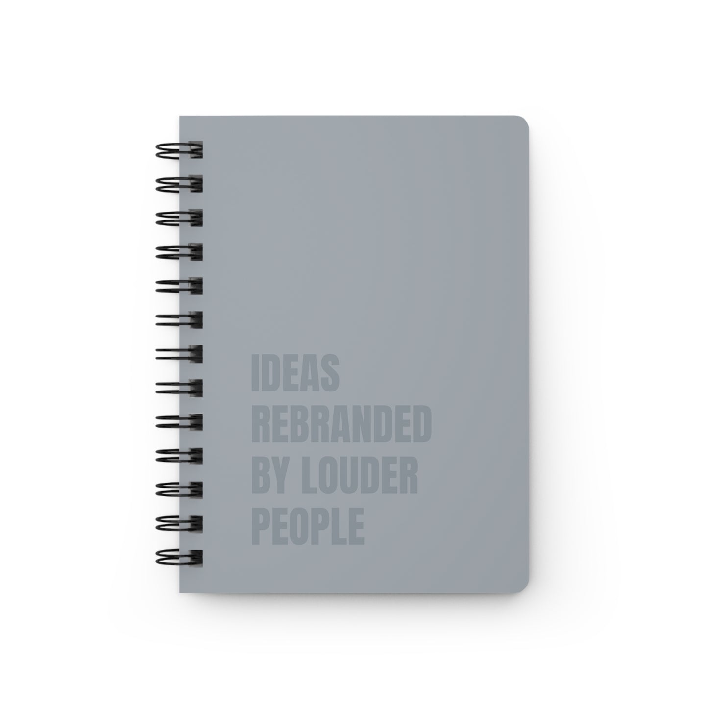 Gray notebook with text on a white background